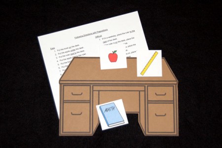 Following Directions with Prepositions with Desk, Apple, Rule, and Book